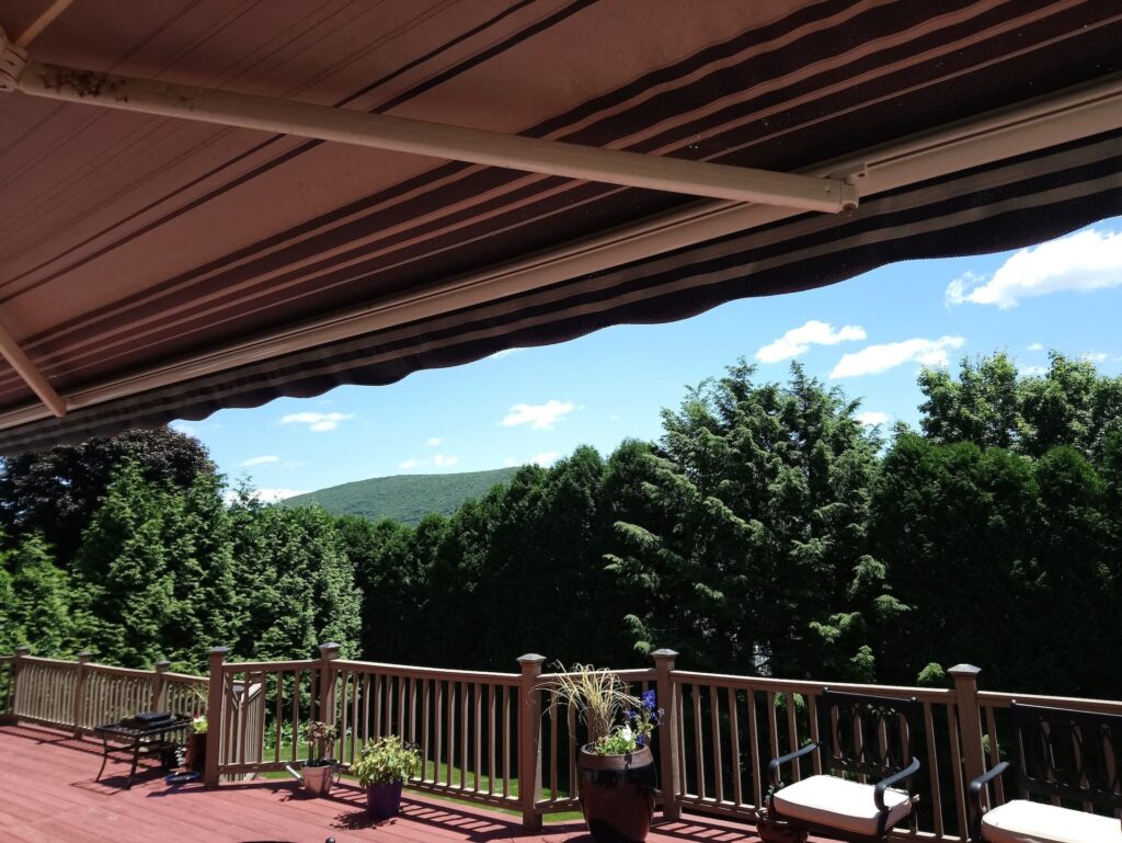 covered deck with awning